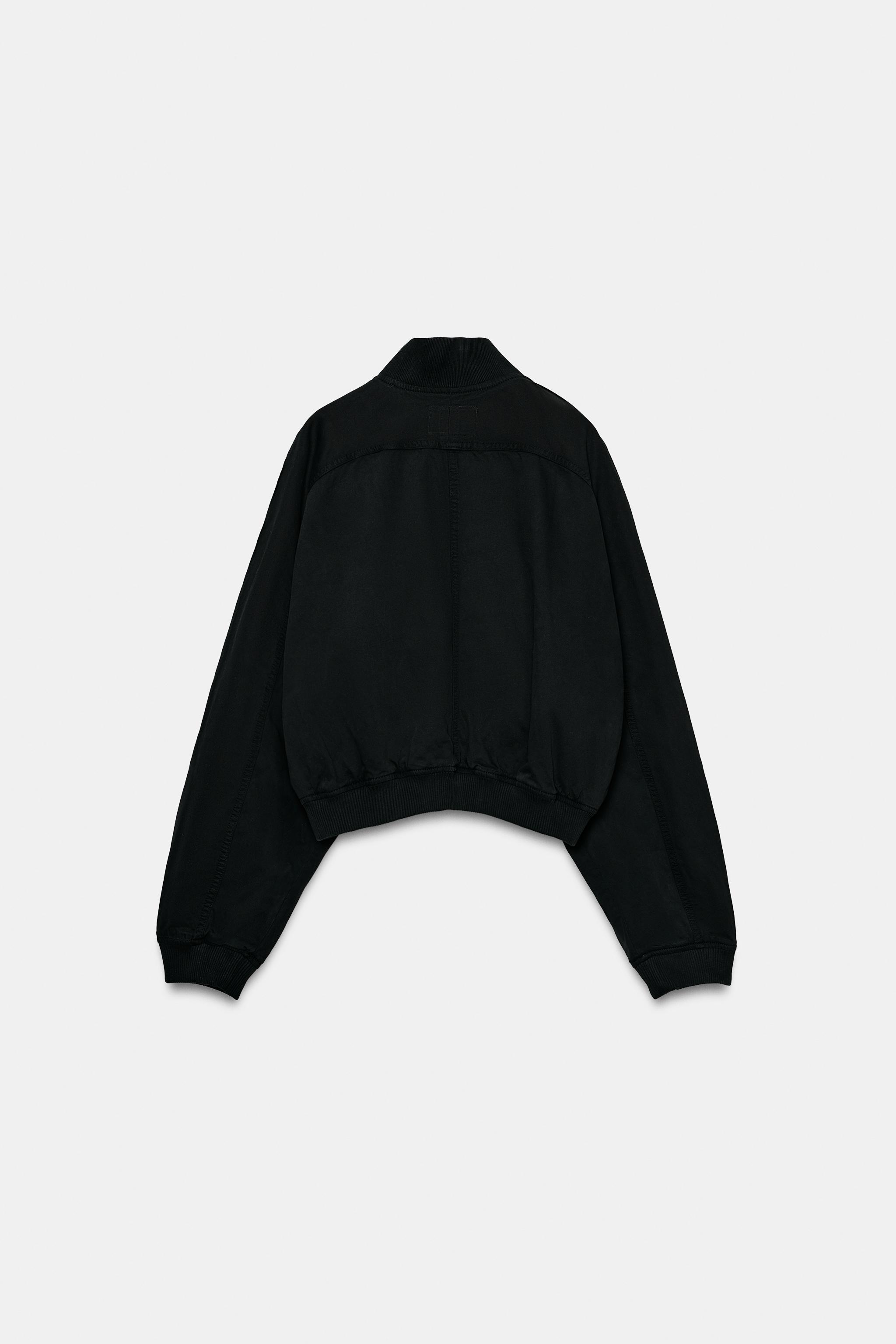 VESTE BOMBER À BAS ASYMÉTRIQUE